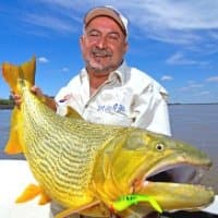 Alex Julius with a chunky dorado nabbed on a Squidgy Slick Rig.